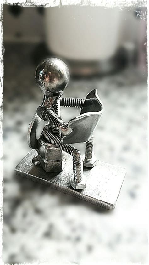 metal box with ivory and metal figurine sitting on top|Amazon.com: Metal Sculpture Table Top.